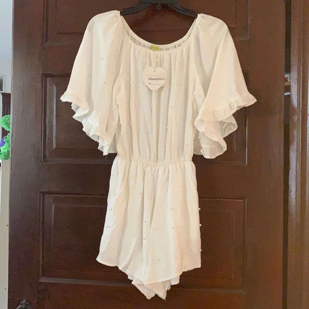 NWT white romper with Pearl accents